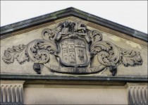 Tympanum over the Administration Block of the Mansion