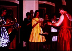 Daphne Bird (Foundation Head of Music) conducting a choir.