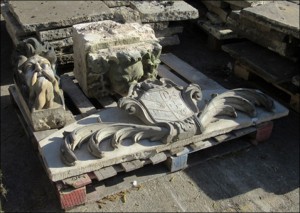 Temporary storage of the keystone of King's Head Hostel, one of the Lion Heads and one of the Savile crests.